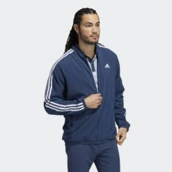 Adidas LINED FZ JKT CRENAV 8 Adidas LINED FZ JKT CRENAV -Golf Supply Store GU5110 on model walking transparent 2000x2000 c53b10f2 6b46 4eeb be4a a6b17598af99